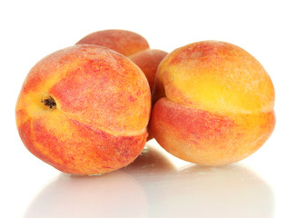 ripe peaches isolated on white background