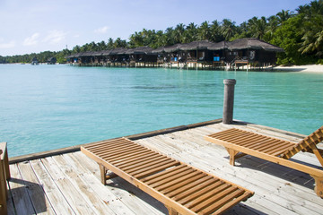 Beach water villa in maldives facing the sea
