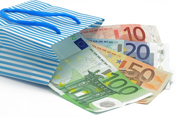 euronoten in einkaufstasche