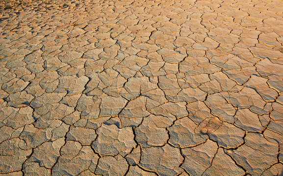Cracked Land Soil Texture On The Ground