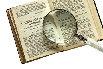 bible book with hand lens
