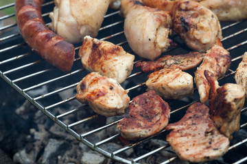 barbecue with delicious grilled meat on grill