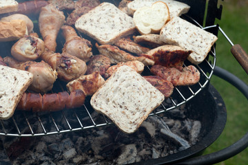 barbecue with delicious grilled meat on grill