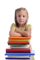 Little girl with stack of books