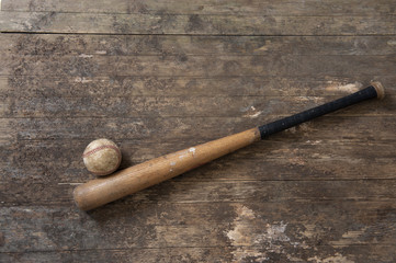 baseball bat and ball on old  grunge floor
