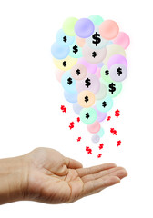 Dollar fall from color balloons to hand