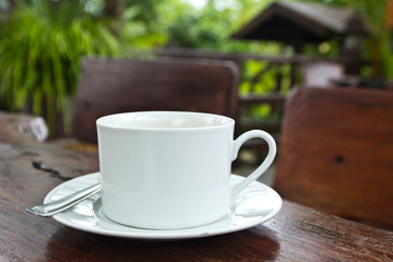 Coffee cup in the garden