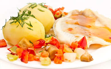 Fillet of sea fish with vegetables and potatoes