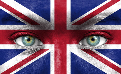 Human face painted with flag of United Kingdom