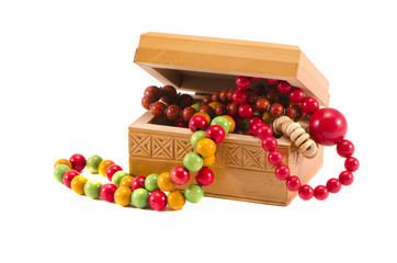 isolated on white vintage wooden necklace in box
