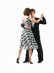 young couple dancing the tango, white background
