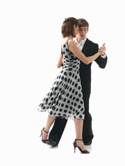 young couple dancing the tango, white background © Daco