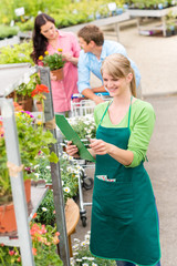Florist at garden center retail inventory