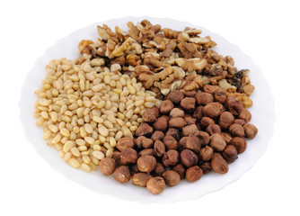 Nuts: hazelnut, walnut,  cedar on white background