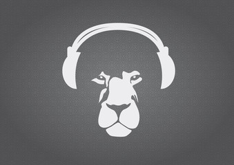 Naklejka premium Lion with headphones