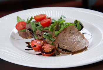 Beef medallions served with balsamic sauce