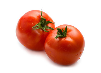 two Red tomatoes on white background