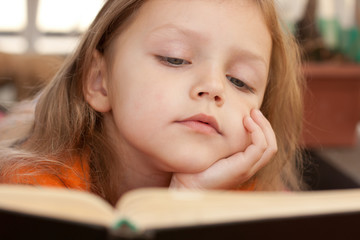 child reading a book