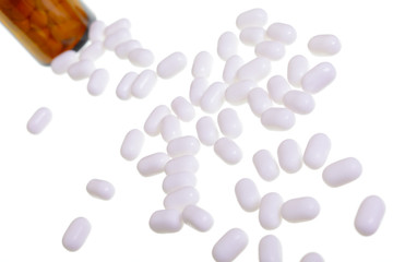 Scattered white pills