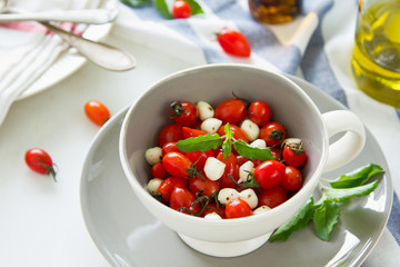 Caprese Salad [Pearl mozzarella ,cherry tomato salad]