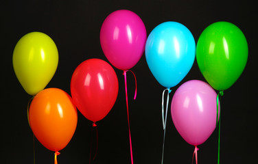 colorful balloons isolated on black background