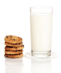 Glass of milk and cookies isolated on white
