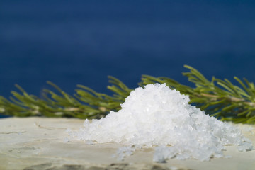 Fresh collected salt and rosmary in the seascape