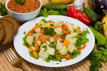 Boiled potatoes with vegetables