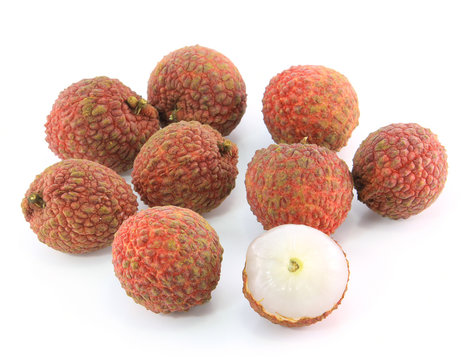 Fresh lychees on white