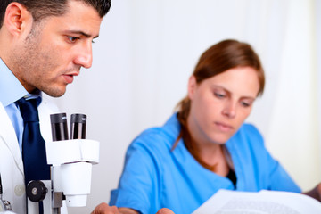 Fototapeta premium Two colleagues working at laboratory