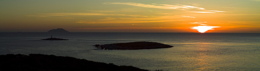Stunning sunset with small islands in Adriatic sea