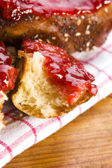 Sweet bread ( challah ) with strawberry jam