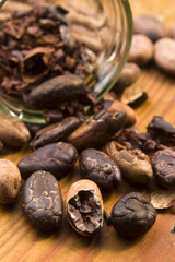 Cocoa (cacao) beans on natural wooden table