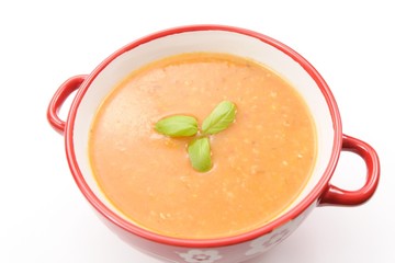 tomato soup in red bowl