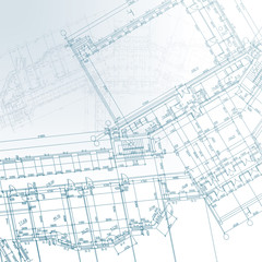 Architectural background with rolls of drawings