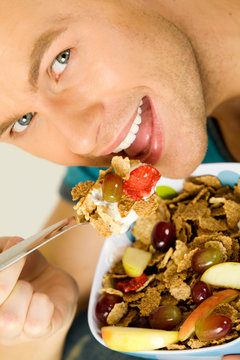 Man eating cerelas