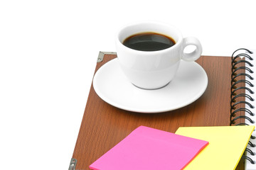 Fototapeta na wymiar Filiżanka kawy i materiałów biurowych