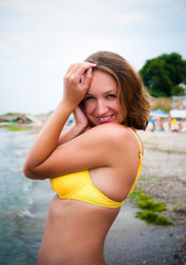 Fashion shot of a beautiful woman at the beach