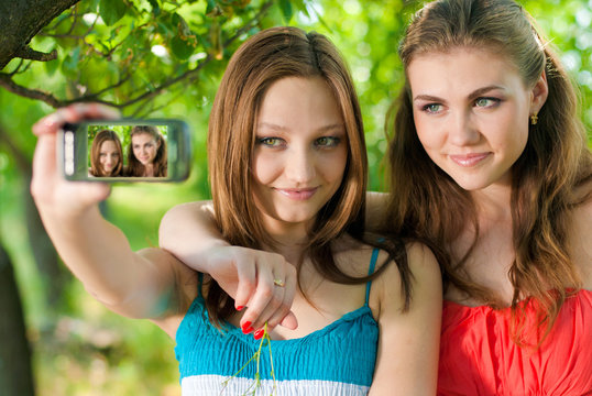 Girls taking picture of themselves