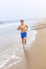 attractive young boy at the beach