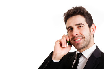 young business man talking on the phone, isolated on white