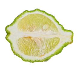 Fresh cut lime half isolated on white background