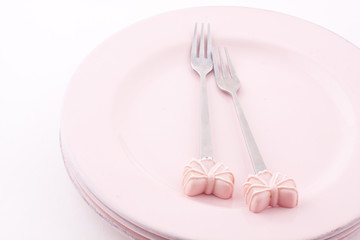 empty plates and forks