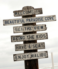 Fototapeta premium Sign on Malibu beach, Los Angeles, California, USA