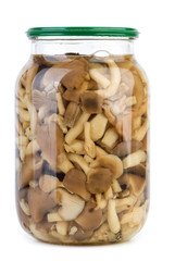 Glass jar with marinated honey agarics