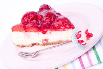 a slice of strawberry cheesecake