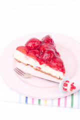 a slice of strawberry cheesecake