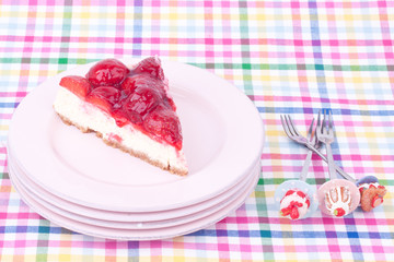 a slice of strawberry cheesecake