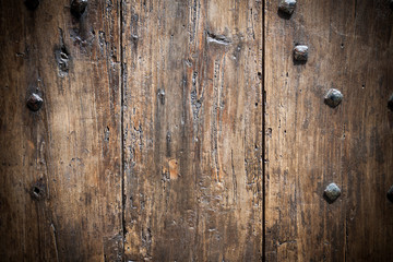Wooden door with nails