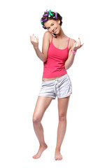 teenager making a call and drying her nails